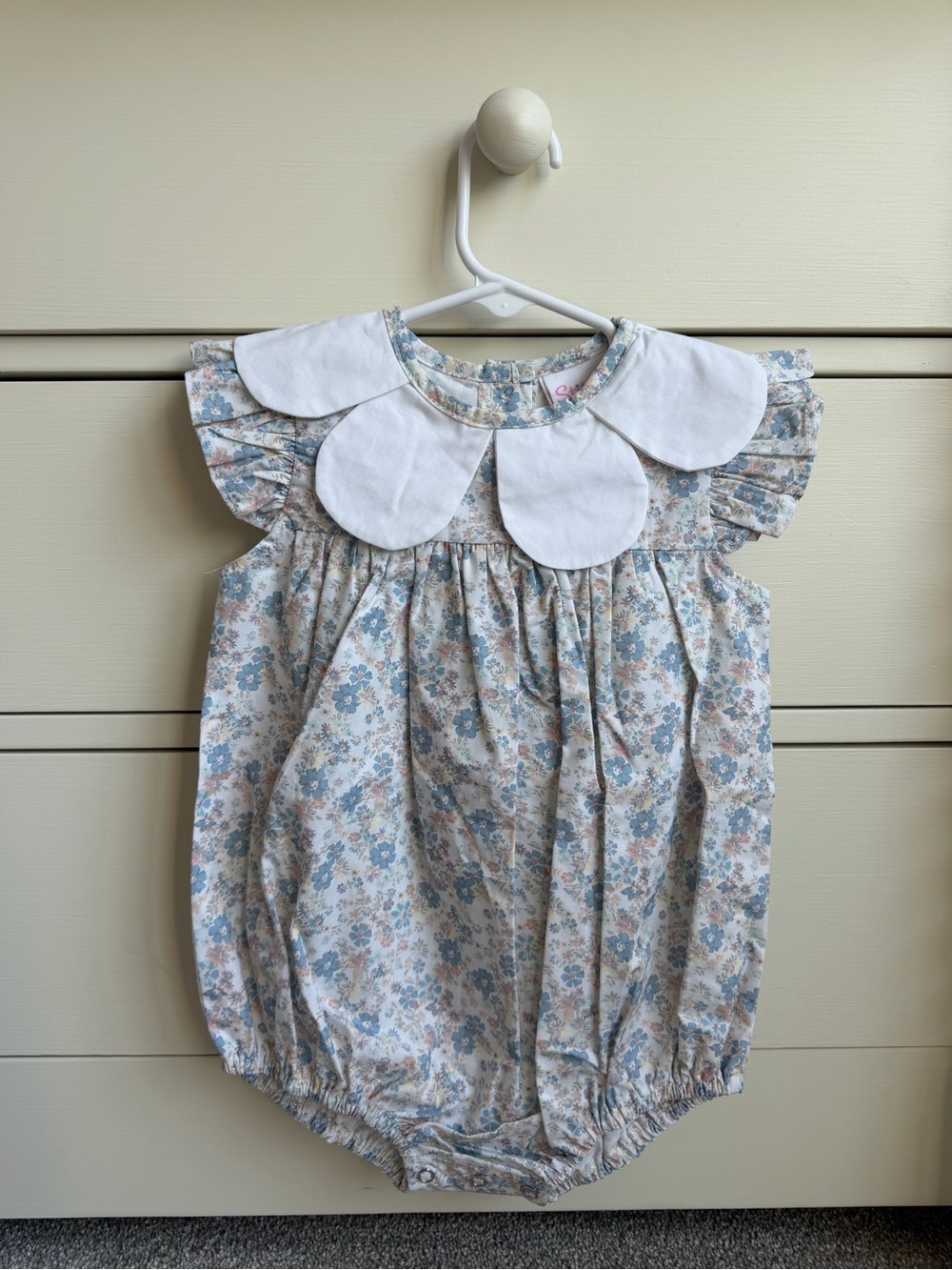 Floral Baby Romper with White Petal Collar